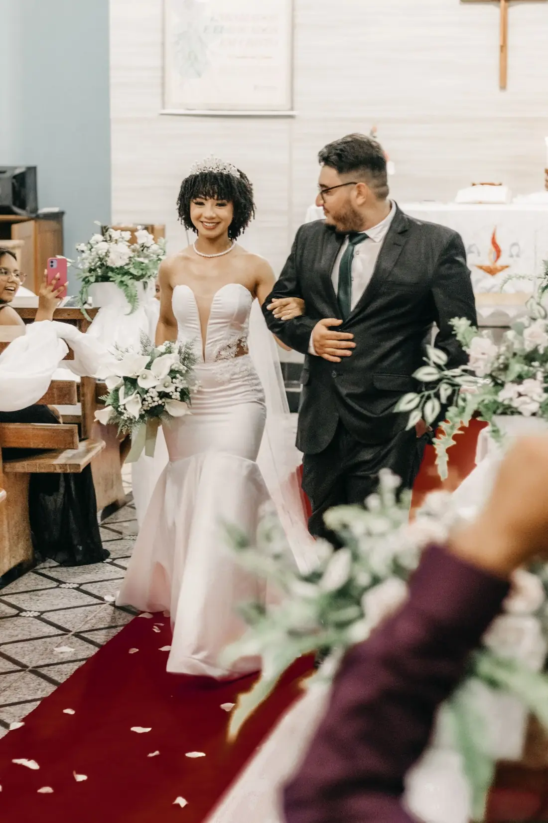 Newlyweds walking down the aisle
